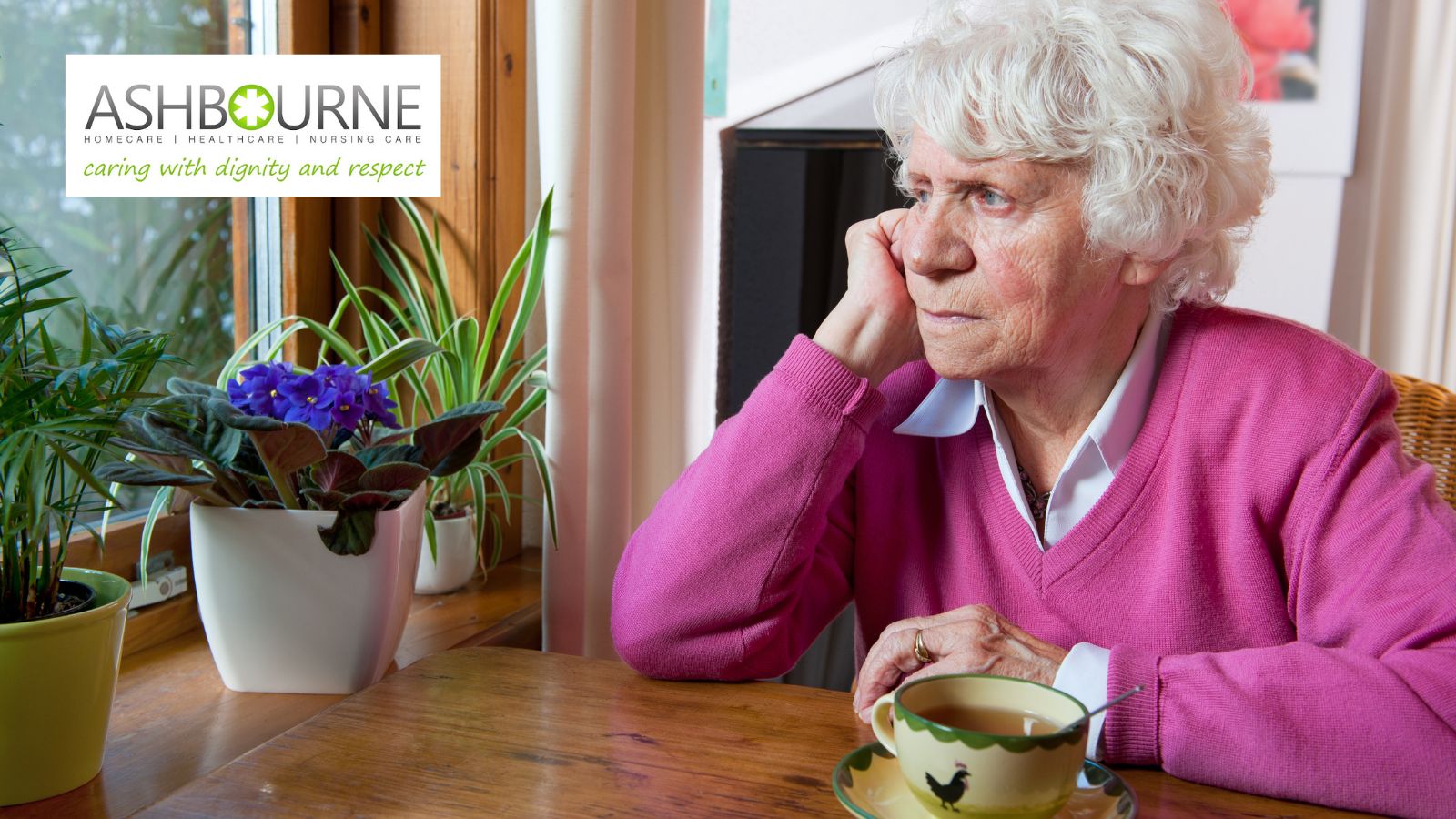 Elderly person sitting at home in a familiar living space